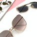 Солнцезащитные очки Prada Q2515