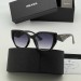 Солнцезащитные очки Prada Q1606