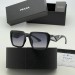 Солнцезащитные очки Prada Q2050