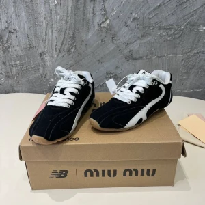 Кроссовки Miu Miu x New Balance F5857